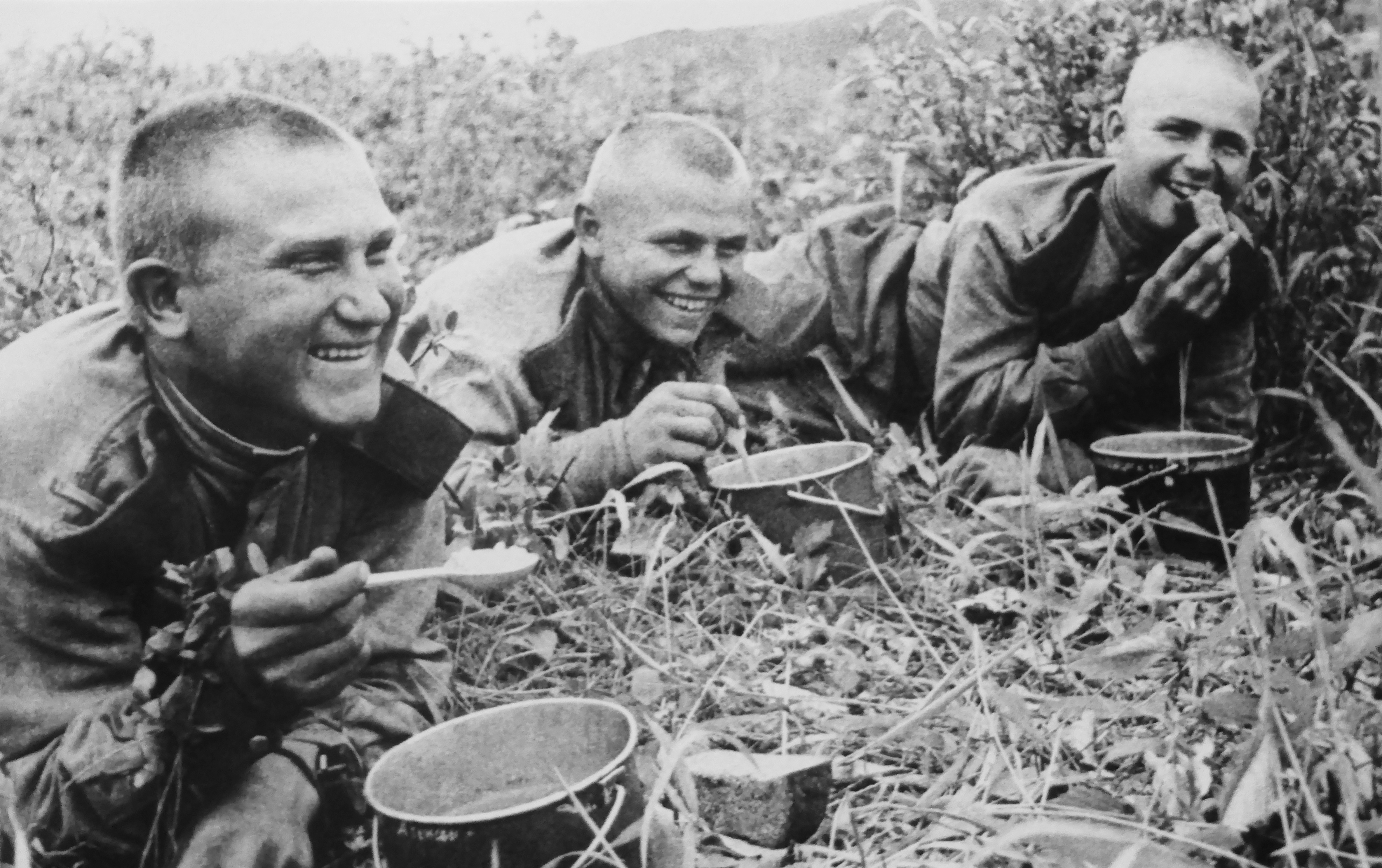 Soldiers of the Soviet 159th Rifle Division at lunch during the battles with the Japanese army