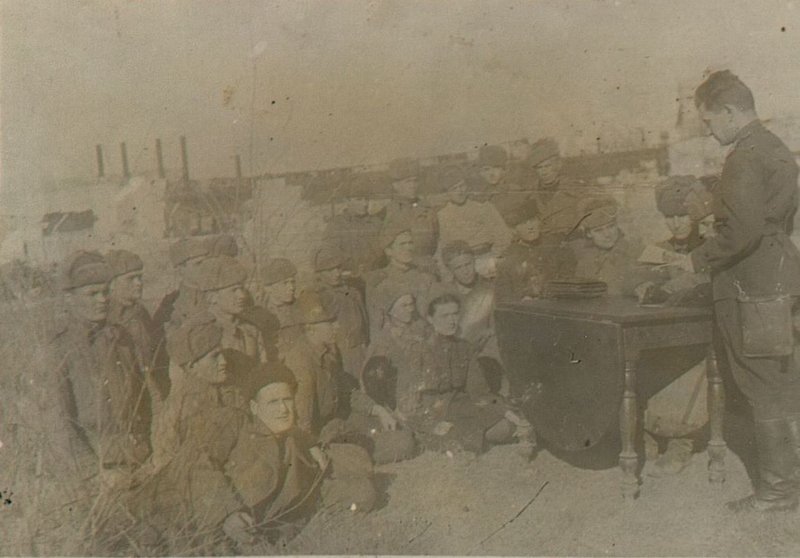 Image: Meeting of the Komsomol activists of the regiment, dedicated to the progress of fulfilling the oath of comrade. Stalin by the Komsomol members on the 25th anniversary of the Komsomol, and the tasks of the Komsomol organization in the upcoming battles for the liberation of Crimea. March 1944 the city of KERCH.
