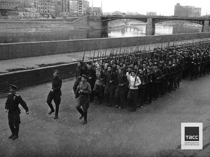 Fighters of universal military training of Frunzensky district during drill on Rostovskaya embankment of the Moscow river