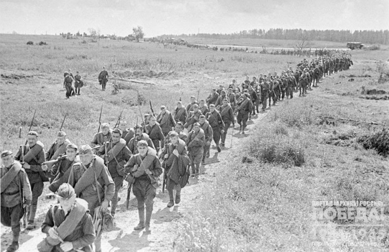 A column of reserve troops is heading to the front line