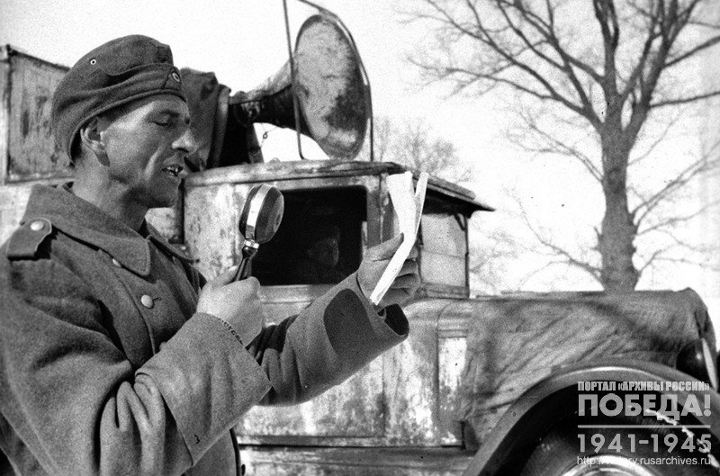 Captured German soldier Max Skiba reads in front of a microphone his appeal to the soldiers of the 1st company with a call to switch to the Red Army side