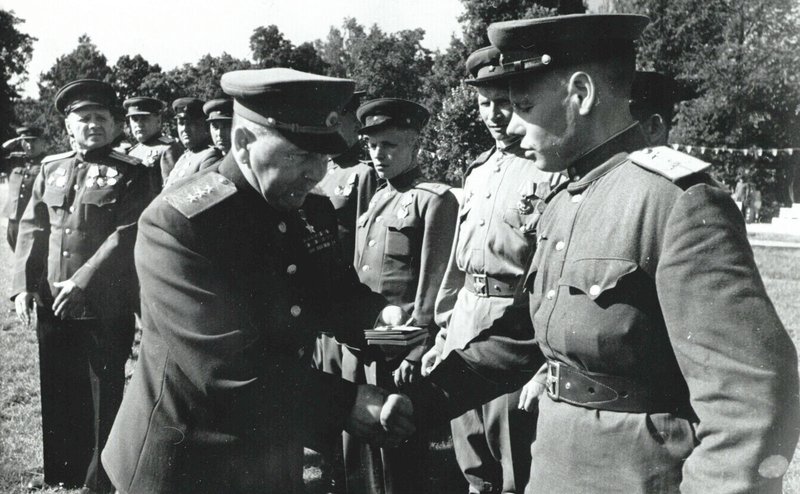 Commander of the 3rd Shock Army, Colonel General V. Kuznetsov awarding soldiers and officers of his army, participated in the assault on the Reichstag