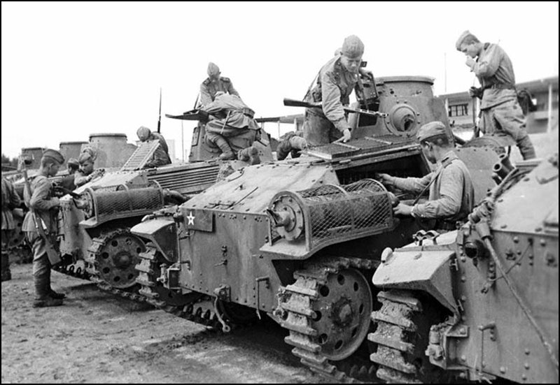 Soviet soldiers inspecting seized Type 95 Ha-Go Japanese tanks