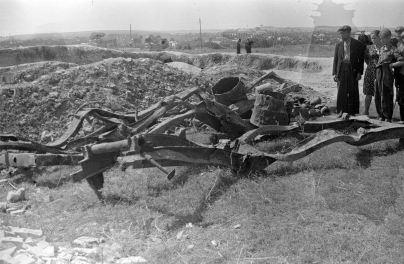 Retrieved from pits Car frames, which were used as gridiron for burning corpses on pyres in Majdanek concentration camp