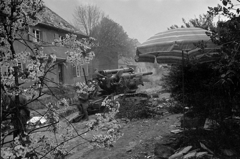 Sergeant N. Meshkov's B-4 howitzer of the 100th Howitzer Artillery Brigade fires in Berlin