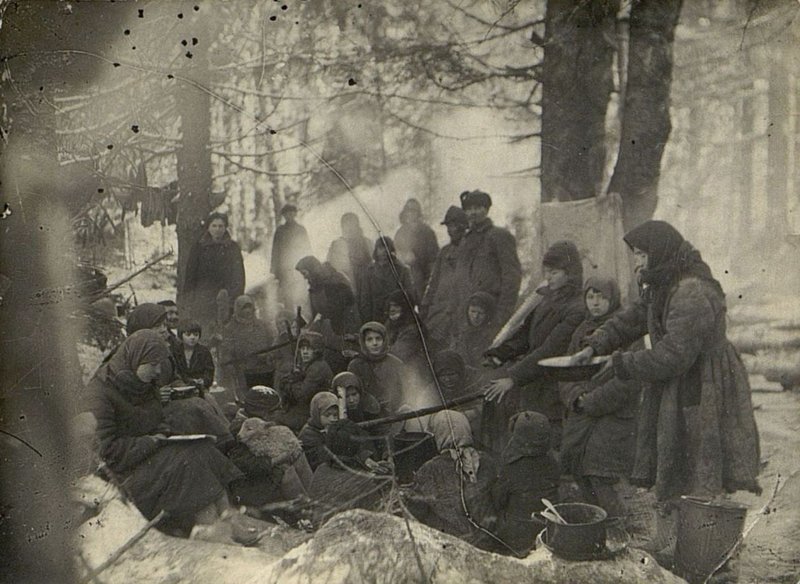 Image: The family of Perkov, Pekhtyareva, Kulagina preparing horse meat dinner