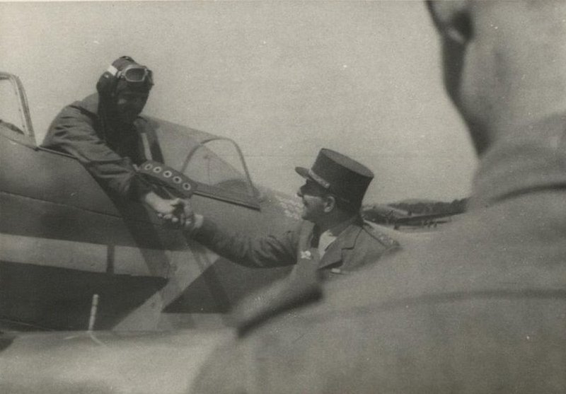 General Jean Marie de Lattre de Tassigny shakes hands with the pilot of the Normandie-Niemen Air Regiment