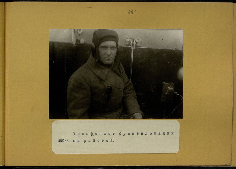The telephonist of the air defense-4 armored platform at the field telephone at work