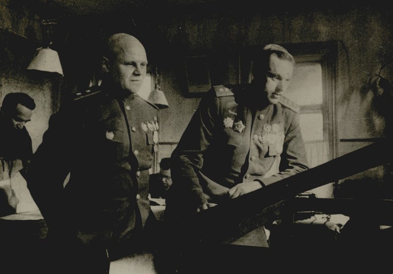 General of Army K. Rokossovsky (right) and Lieutenant General K. Telegin at the op-erational map at the headquarters of the 1st Belorussian Front