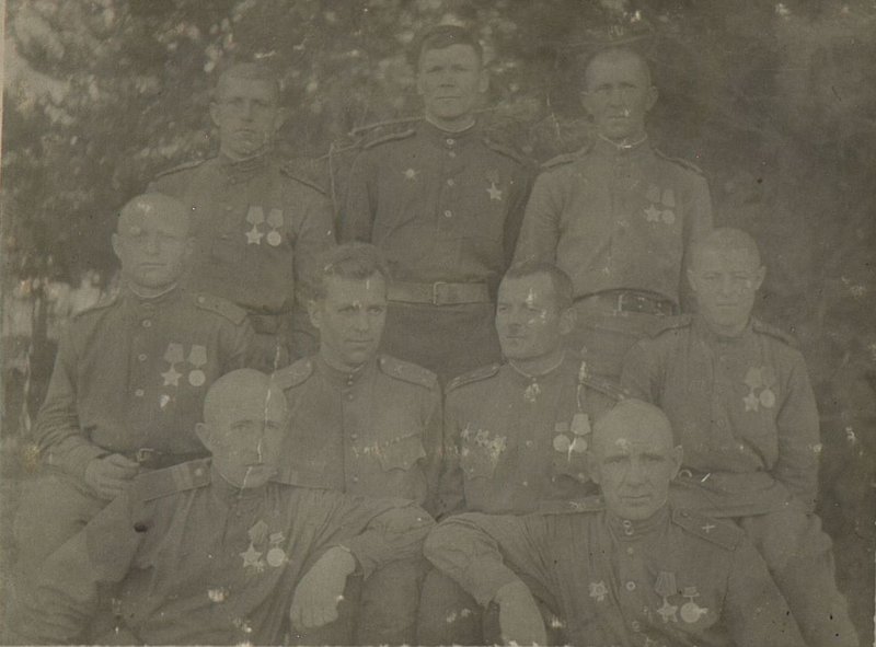 Image: The commander of the regiment, lieutenant colonel comrade Akhtyrchenko and the deputy commander of the regiment for political affairs, lieutenant colonel comrade Chernyshev with a group of privates and sergeants, comrades Kutsenko, Lyashko, Beglitsa, Bely, Nechepurenko, Falko, Mikhailov, holders of the Order of Glory III degree awarded for the displayed glory and courage liberation of Crimea. May-June 1944