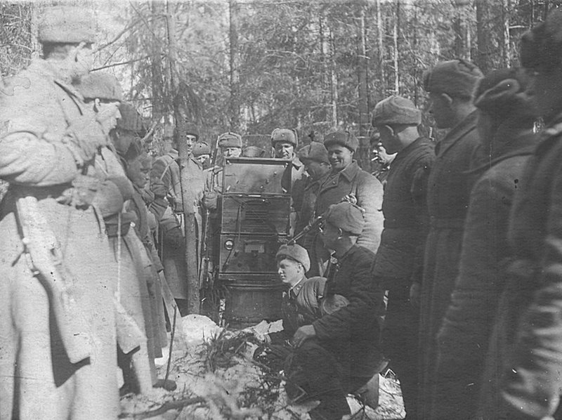 Soldiers listen to the Sovinformburo report on the radio. Moscow Region. 1942