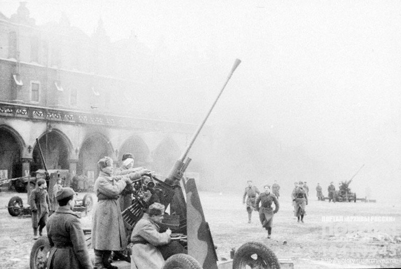 Soviet AA-crew firing at enemy aircraft from one of the squares of Krakow