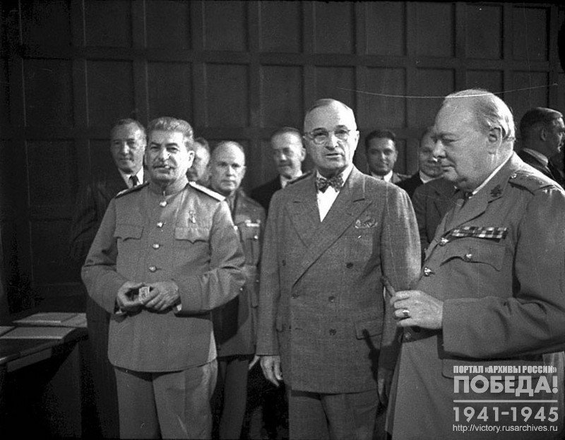 Joseph Stalin, G. Truman and W. Churchill in convention hall sidelines at Potsdam Conference Hall