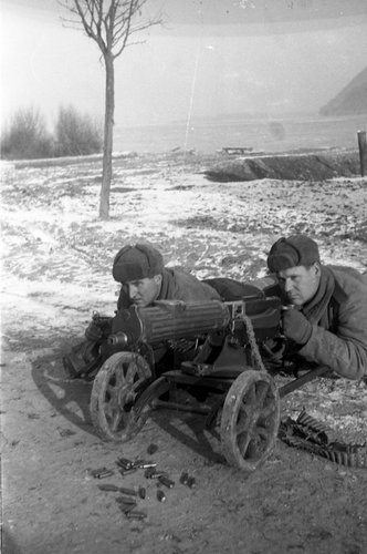 Soviet machine gunners T. Leshchuk and A. Bereza fire at the enemy near Budapest