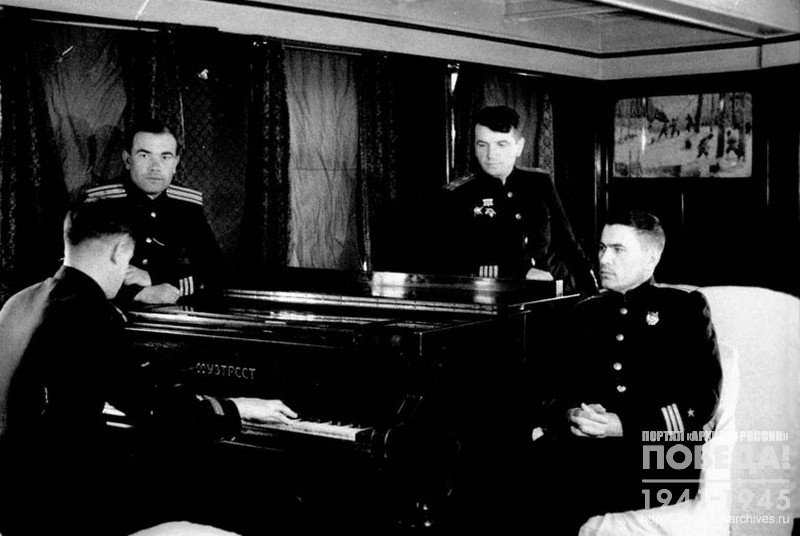 Officers of the Red Banner division of submarine destroyers relax in the music room between battles