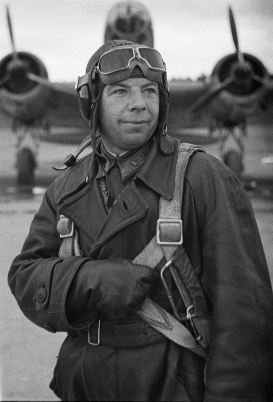Twice decorated with order captain M. Simonov of “X” aircraft unit near his aircraft
