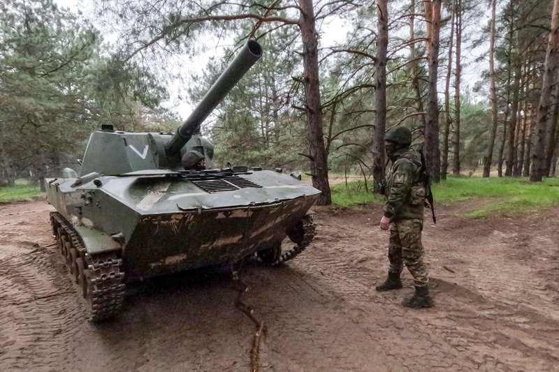 Operation of "Nona-S" self-propelled artillery unit calculation in Kherson region. Russia. Kherson region. Servicemen during combat operation of "Nona-S" self-propelled artillery unit calculation on the left bank of Dnieper river in the Special Military Operation zone