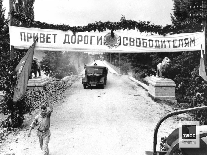Entering the city of Veliko Tarnovo, decorated with wreaths and banners, Bulgaria