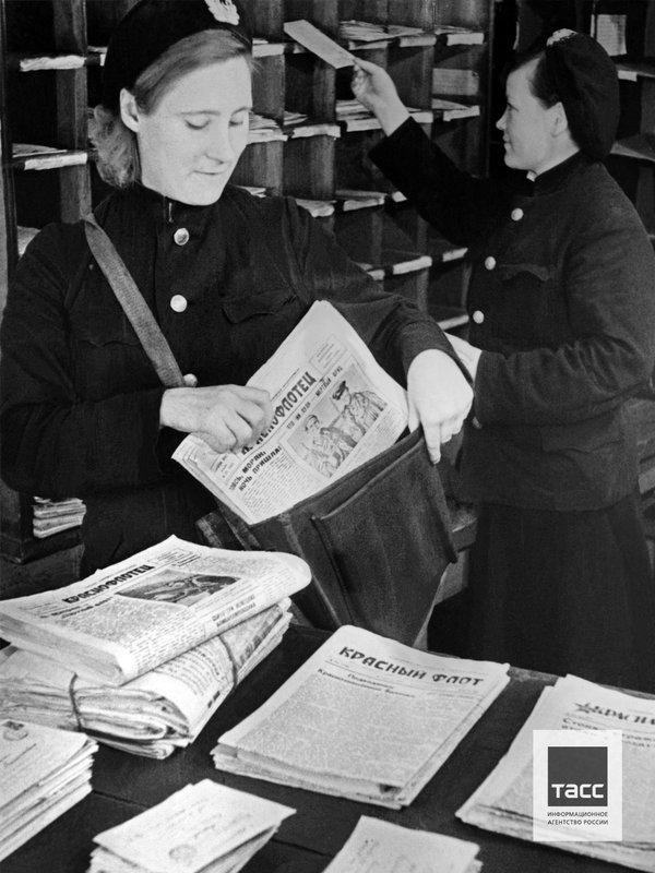 Military mail service workers sort out mail and press at the Northern Fleet