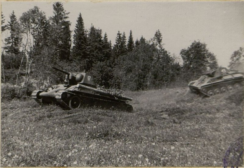 Image: Combat vehicles overcome a wetland area