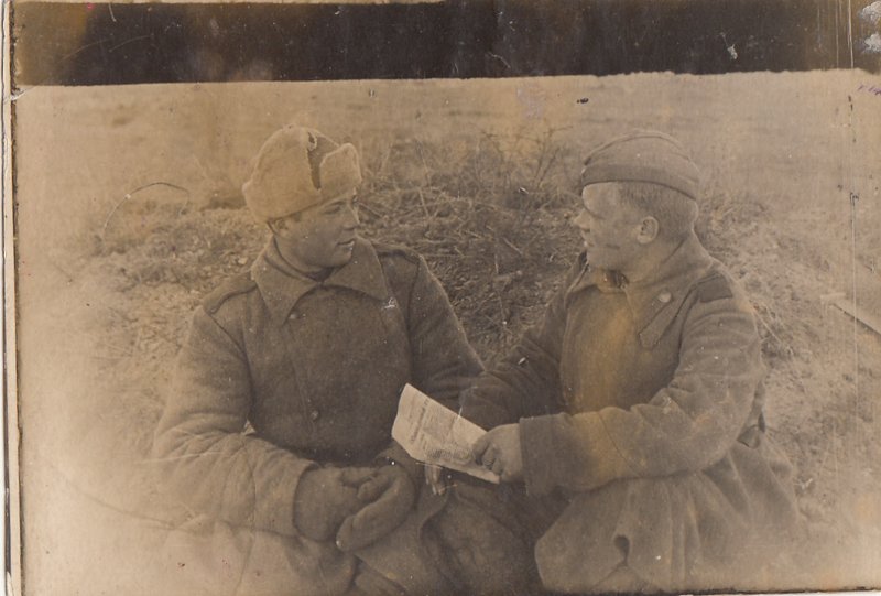 In a minute of peace, reading the paper. 1944