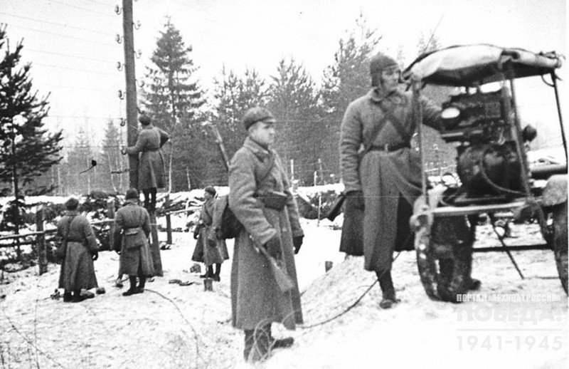 Field communications crewmen restore telegraph line damaged by Finns during retreat   


