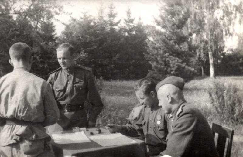 Presentation of Komsomol badges. Germany, Berlin, May 1945