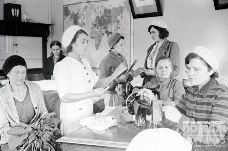 Female workers of the Big Ivanovo Manufactory prepare gifts for Red Army soldiers
