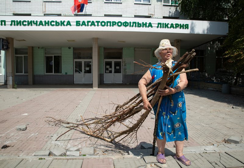 Situation in Lisichansk. Woman outside the city hospital building