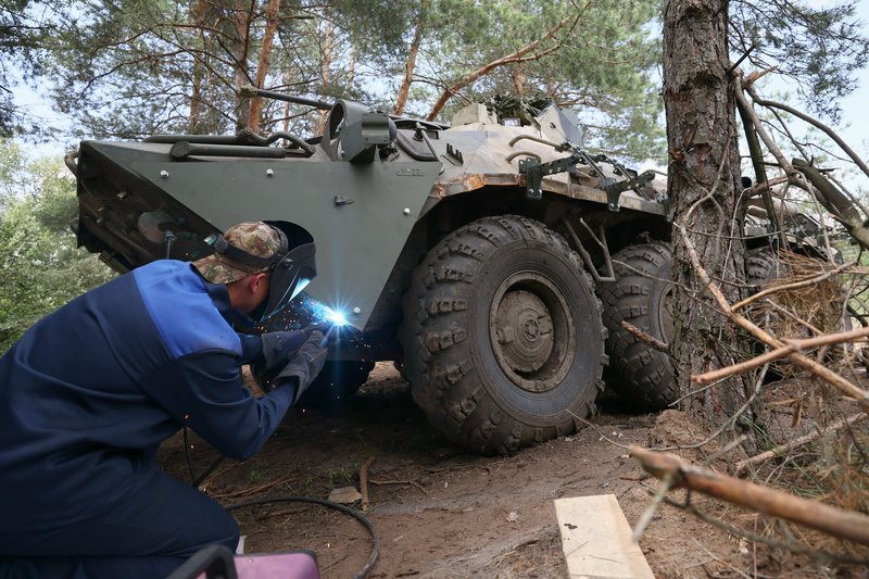 Repair of Russian Airborne Forces (VDV) military equipment in a field camp in the LPR