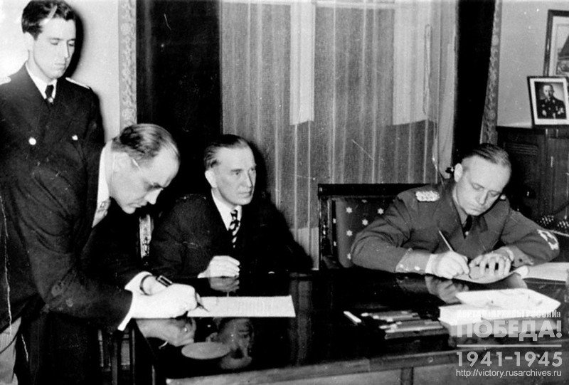 Lithuania Ambassador to Germany Mr. Skirka  and German Foreign Minister Joachim von Ribbentrop signing Lithuanian Seimas Act in Memel (Klaipeda, Lithuania)