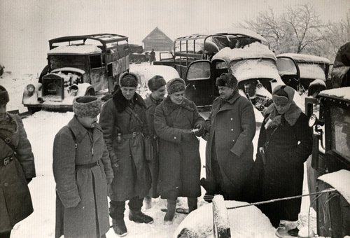 Generals M. Katukov, K. Rokossovsky and Divisional Commissar A. Lobachev examine abandoned enemy’s military equipment