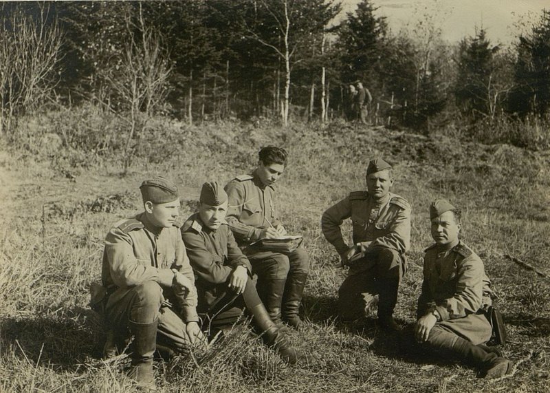 Image: Meeting of the party bureau of the 1058th rifle regiment. In the center is the regiment party organizer Captain Rybin