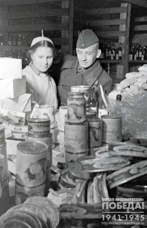 Employees of one of the warehouses in Moscow form food parcels to be sent to the front