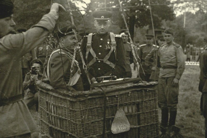 K. Rokossovsky in the hot air balloon gondola, standing in the control cabin in a form of wicker basket
