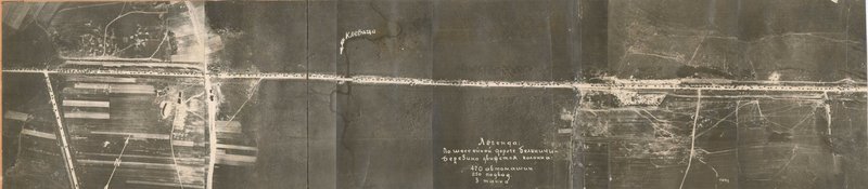 Image: A solid column of enemy vehicles on the forest section of the highway in the area of the north-east of Pogost. In the center of the photo - a section of road on which a panorama of broken cars