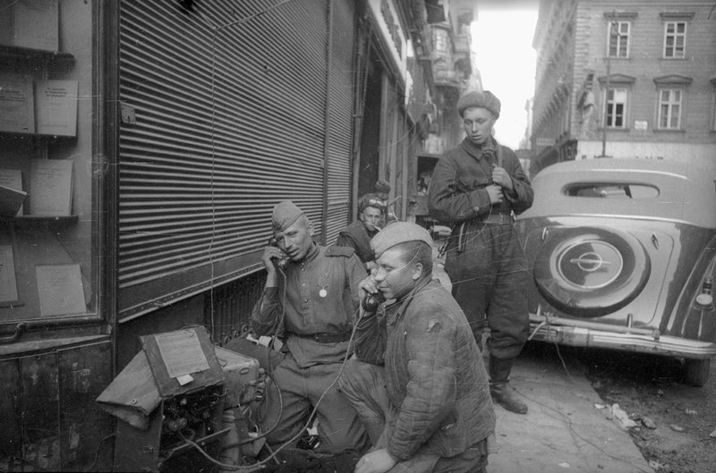 Signalmen correct artillery fire on the outskirts of Budapest