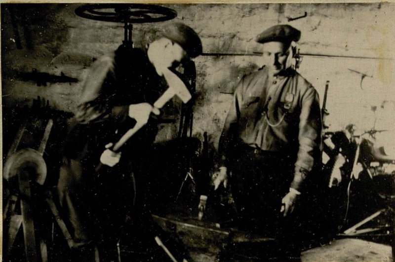 Image: The blacksmith corporal Syrovatkin in the forging shop organized the production of front spring suspensions and proposed a method for cementation of the front axle pins and rear spring pins