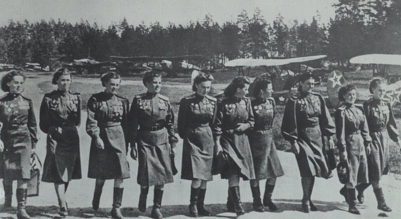 Women pilots of the 46th Guards night bomber aviation regiment on an airfield participated in aviation parade