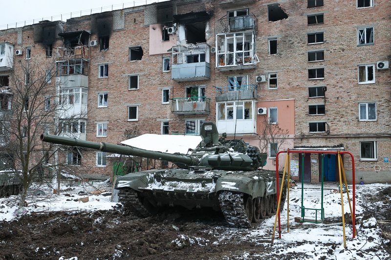 City Volnovakha, passed under control of the DPR. T-72 tank next to a house damaged as a result of shelling.