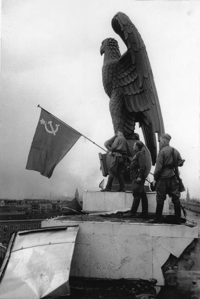 Third Victory Banner at Berlin Tempelhof Airport with Evgeny Khaldei in the foreground