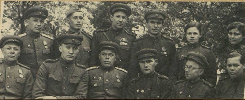Image: From left to right 1st row: mayor Sukharev, Major of the medical service Paltarak, Guard Major of the medical service Morugiy, Major of the medical service Mozzhegorov, Major of the medical service Pertsovsky, Captain of the medical service Kidanova, 2nd row: Captain of the medical service of the medical service Osvirin, Captain Sidorenko, Senior Lieutenant of the medical service Kats, Senior  Lieutenant of the medical service Pertsovskaya