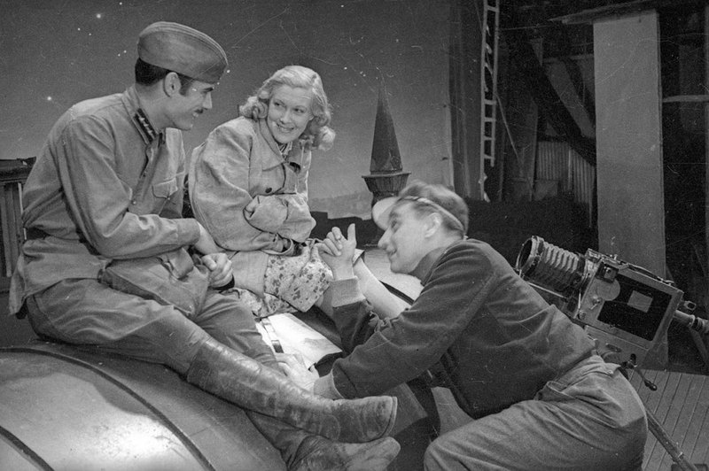 Movie director Grigory Alexandrov, actor Hosrov Melikov and actress Lubov Orlova during the shooting of the movie “One family”. Baku