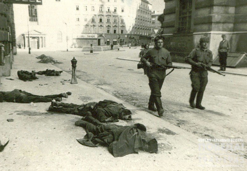 Soviet soldiers walking along one of the streets of liberated Vienna