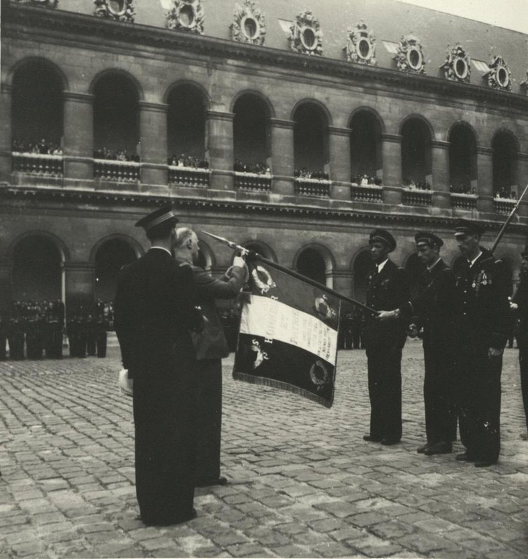 Minister of Aeronautics and Armaments Charles Tillon presents the Order of the Legion of Honor to the legendary Normandie-Niemen Air Regiment