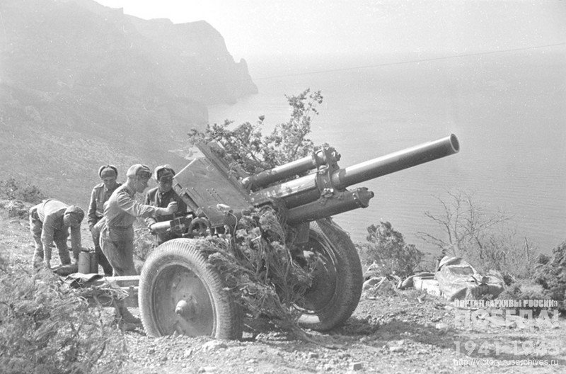 Gun crew of the order bearer Petty Officer N. Chmilenko firing at the fortifications of the enemy during the battle near the town of Sevastopol. Village of Simeiz, May 4, 1944