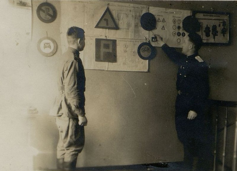 Image: Company Commander Senior Technician Lieutenant Forsman Explains Road Signs