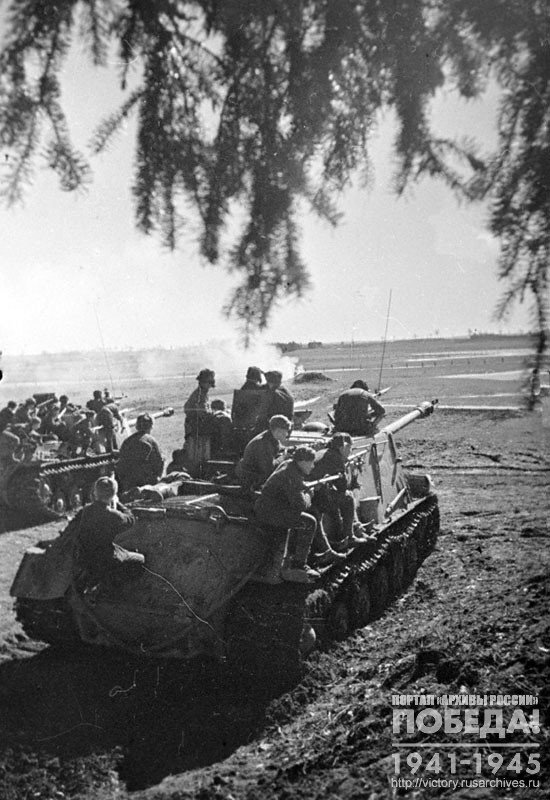 Self-propelled guns carrying assault force attack enemy positions in the vicinity of Konigsberg