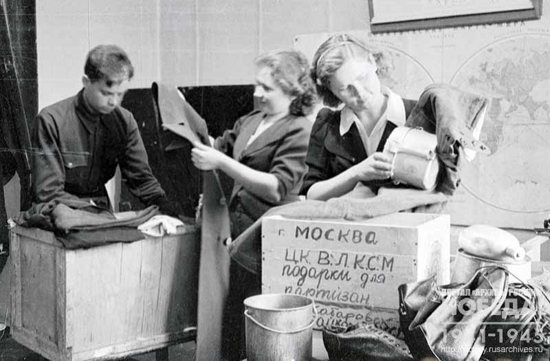 Komsomol members of Khabarovsk preparing parcels with gifts for Soviet partisans