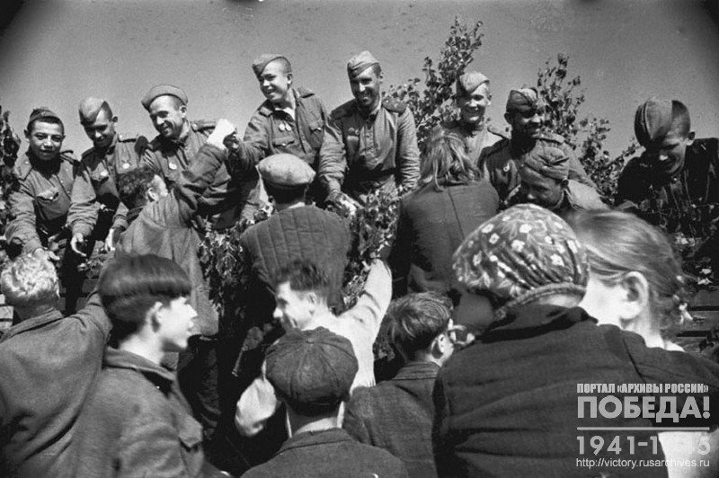 The population of liberated Latvia regions greeting the soldiers of Red Army